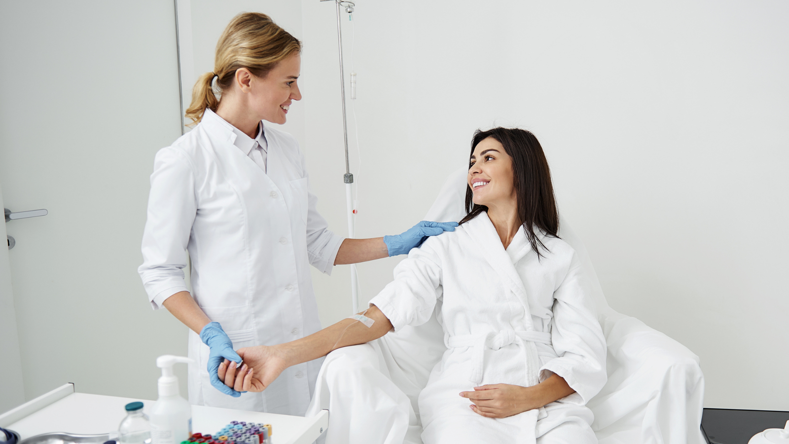 Healthcare professional practicing IV hydration therapy during hands-on training session